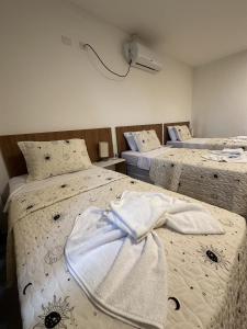 Postel nebo postele na pokoji v ubytování Hotel Formosa - Posto da Mata