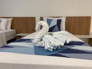 Postel nebo postele na pokoji v ubytování Hotel Formosa - Posto da Mata