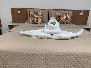 Postel nebo postele na pokoji v ubytování Hotel Formosa - Posto da Mata
