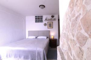 Posteľ alebo postele v izbe v ubytovaní Lovely Apartment ES