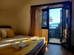 Cama ou camas em um quarto em Forte Rose Hotel