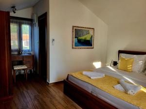 Cama ou camas em um quarto em Forte Rose Hotel