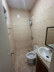 a bathroom with a toilet and a sink at Stay Inn 3 Boracay in Boracay +13 photos