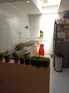Kuchyň nebo kuchyňský kout v ubytování Casa en Quintero