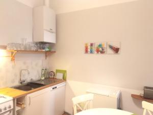 Kuchnia lub aneks kuchenny w obiekcie City-Apartments Langegger