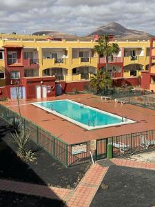 Swimmingpoolen hos eller tæt på Casa Azul - La Caleta