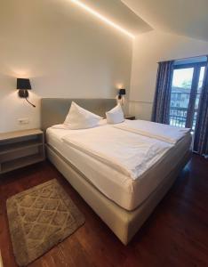 Postel nebo postele na pokoji v ubytování Gasthaus - Hotel Alt Fürstätt