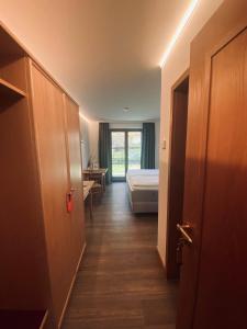 Postel nebo postele na pokoji v ubytování Gasthaus - Hotel Alt Fürstätt