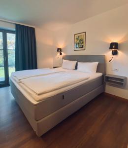 Postel nebo postele na pokoji v ubytování Gasthaus - Hotel Alt Fürstätt