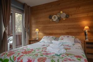 Ένα ή περισσότερα κρεβάτια σε δωμάτιο στο Le Guilazur