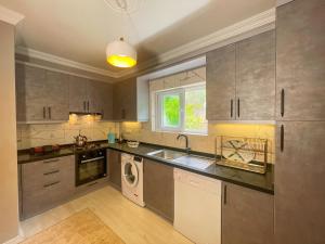 Kuchyň nebo kuchyňský kout v ubytování Villa Güneş