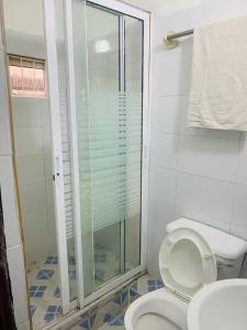 Koupelna v ubytování Cozy room Shortlet Apartment in Ikoyi, Lagos