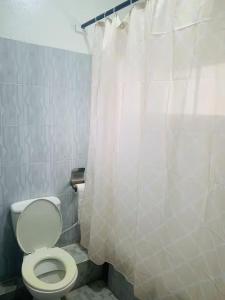 Koupelna v ubytování Cozy room Shortlet Apartment in Ikoyi, Lagos