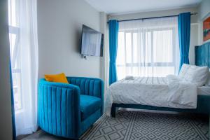 Postel nebo postele na pokoji v ubytování Nyayo View Studio with Amazing Views