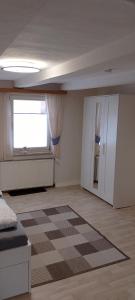 Кровать или кровати в номере Ferienwohnung Käthchen