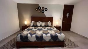 Postel nebo postele na pokoji v ubytování Pedernal Hotel