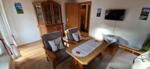 Et tv og/eller underholdning på Fewo Iseler, Ihr Bett im Allgäu