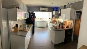 Köök või kööginurk majutusasutuses Appartement 2 chambres centre ville d Ajaccio avec magnifique vue mer