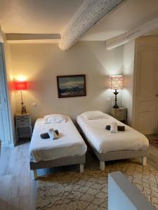 Ένα ή περισσότερα κρεβάτια σε δωμάτιο στο Cannes historic center