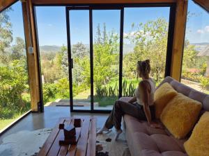 Tiny House El Refugio的休息区