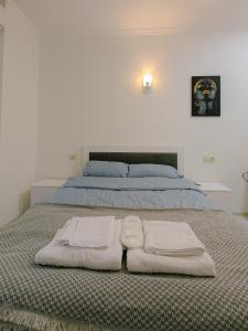 Postel nebo postele na pokoji v ubytování Luxury apartment in Batumi