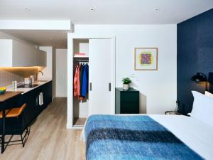 Vertus Edit Canary Wharf客房内的一张或多张床位