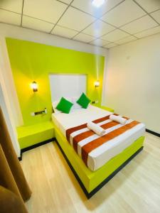 Voodi või voodid majutusasutuse Wilroma Hotel&Resort toas