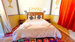 Cama o camas de una habitación en Kasbah Erg Chebbi