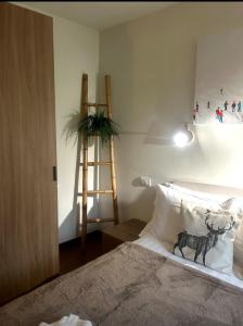 Ένα ή περισσότερα κρεβάτια σε δωμάτιο στο Maison Du Coeur Champoluc - Spa, Gym e aree relax +55 φωτογραφίες