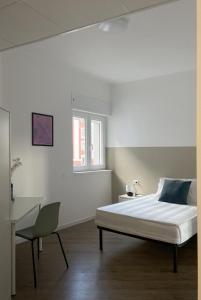 Postel nebo postele na pokoji v ubytování Guest House Biscardi