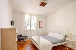 Postel nebo postele na pokoji v ubytování Santo Stefano Square