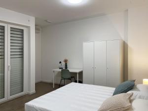 Postel nebo postele na pokoji v ubytování Guest House Biscardi