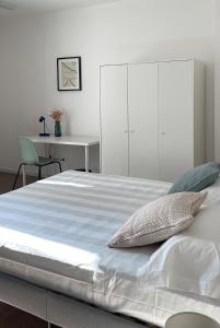 Postel nebo postele na pokoji v ubytování Guest House Biscardi