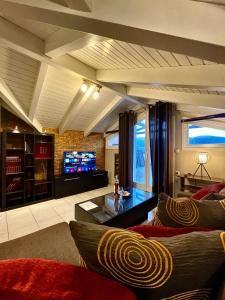 A television and/or entertainment centre at Ira Apartments