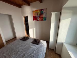 Postel nebo postele na pokoji v ubytování Villa Šoti