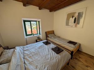 Postel nebo postele na pokoji v ubytování Villa Šoti
