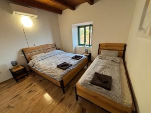 Postel nebo postele na pokoji v ubytování Villa Šoti