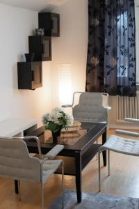 Posezení v ubytování Säffle Suites by Svaneholm Hotel