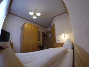 Voodi või voodid majutusasutuse Gasthof Bokan toas