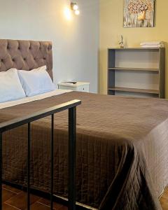 Кровать или кровати в номере Hotel Herrera