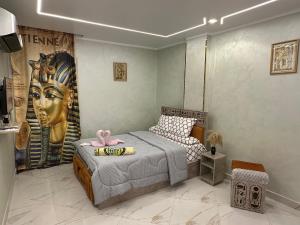 Krevet ili kreveti u jedinici u objektu Hapi Pyramids Hotel