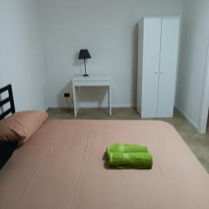 Postel nebo postele na pokoji v ubytování Alloggio Le Palme