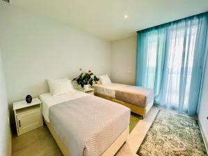 Postel nebo postele na pokoji v ubytování La Pimentera Penthouse - Casa Banderas + 37 fotografií