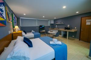 Voodi või voodid majutusasutuse Casa Bugambilia - Alma Hotels toas