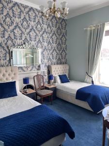 Voodi või voodid majutusasutuse Bray Head B&B toas