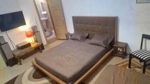 Ένα ή περισσότερα κρεβάτια σε δωμάτιο στο Chambre d Hôte N2 avec 2 Lits