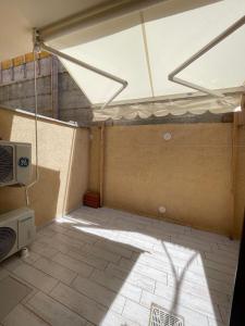 an empty room with a roof with a window at Da Marta Appartamento VISTA MARE MOZZAFIATO ISOLA ROSSA in Cascabraga