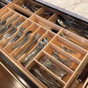 a drawer full of silver utensils in a kitchen at Sunshine in Tokyo +23 photos