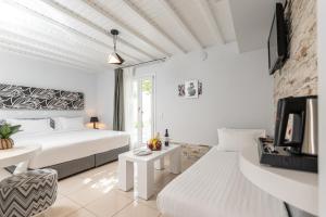 Postel nebo postele na pokoji v ubytování Galaxy Hotel Naxos + 37 fotografií