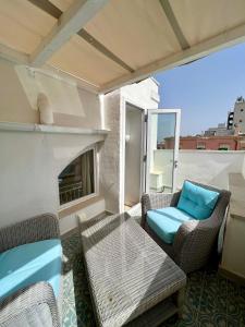 Posezení v ubytování Vittorio Emanuele Charming Suites